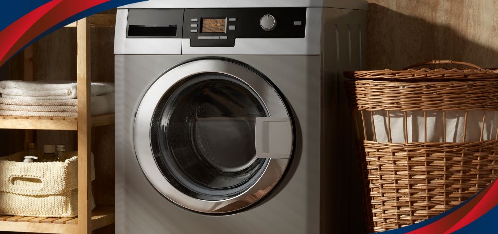 A fully automatic washing machine in the Philippines alongside a woven laundry basket